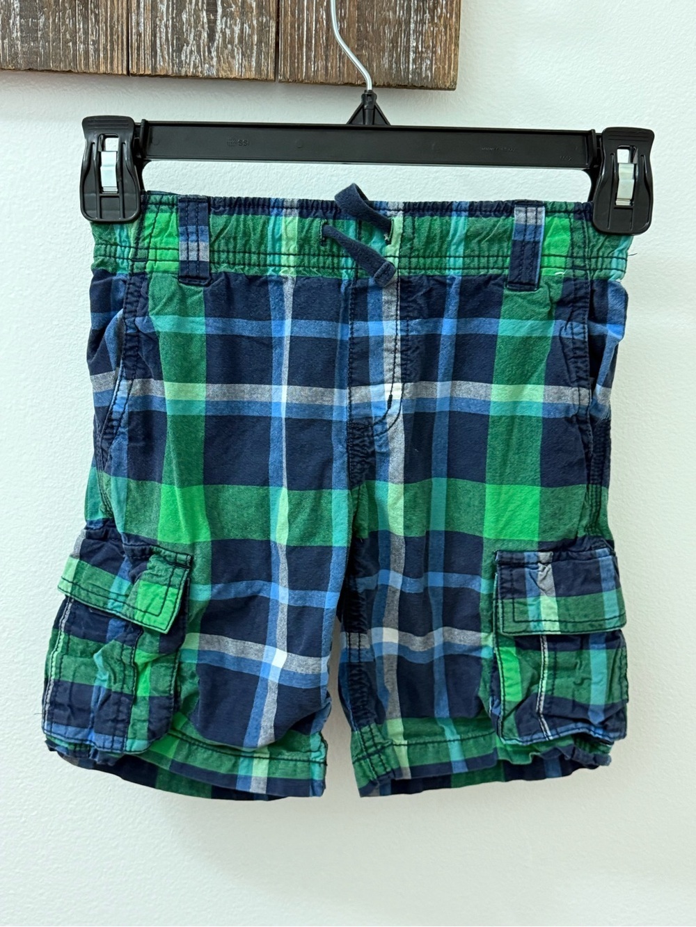 Gymboree boys green and navy blue plaid cargo shorts with an elastic waistband.